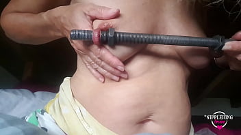 nippleringlover kinky inserting 16mm rod in extreme stretched nipple piercings part1