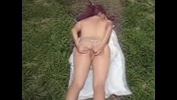 Exhibitionist-slut-wife-almost-naked-in-public-park-to-tan-3