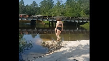 public peeing outside summer on the river